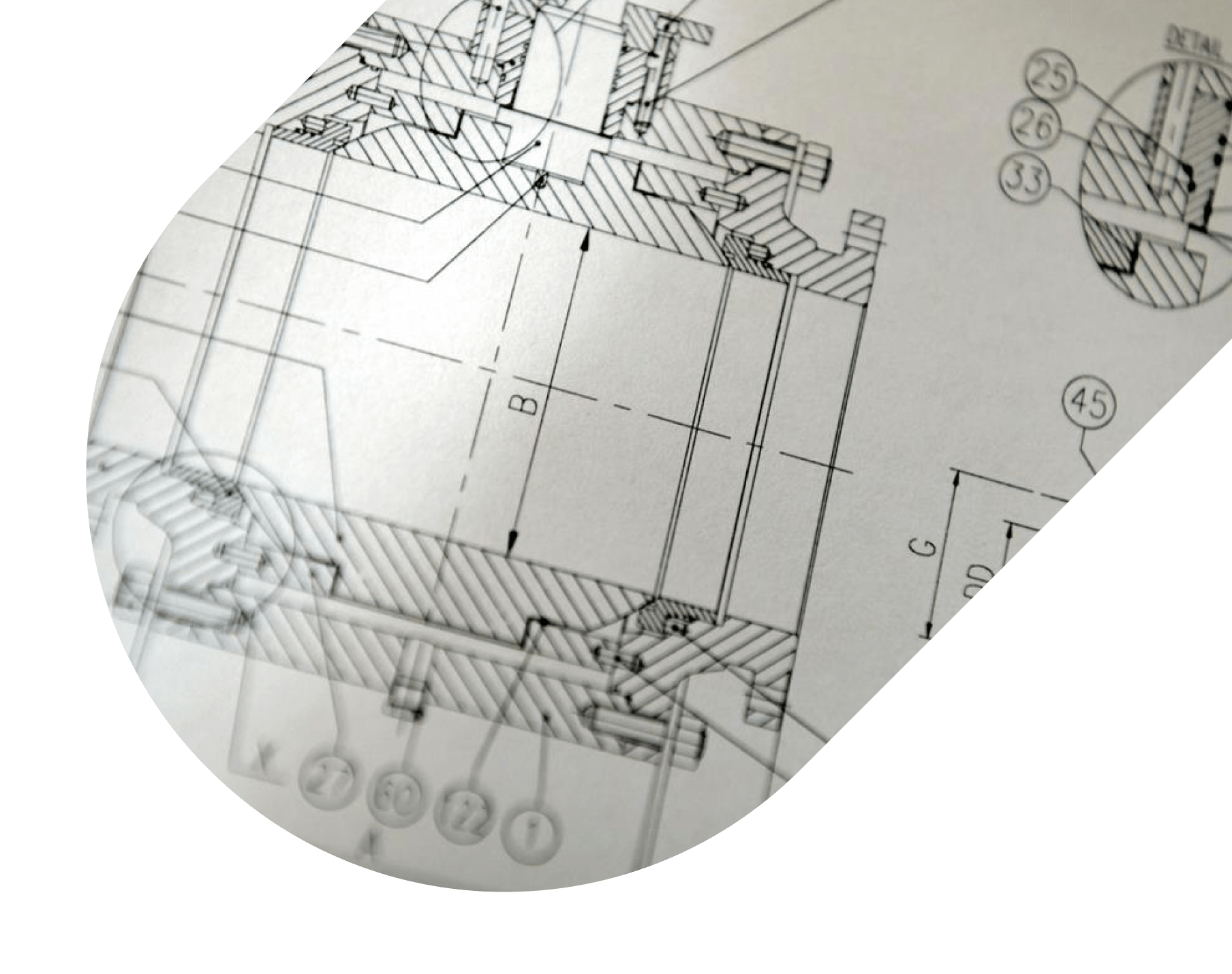 Close-up of a mechanical engineering CAD drawing with cross-sections and labeled dimensions.